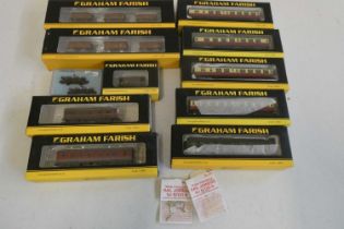 Graham Farish N Gauge rolling stock comprising seven BO coaches and nine goods wagons, all items