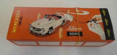 Late Issue Schuco 2095 Mecedes 190 finished in silver, boxed, Excellent to mint