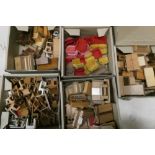 Five boxes of dolls house furniture, comprising one box of upholstered sit on suites and four