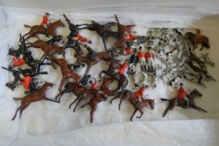 Britains hunt figures comprising fifteen hunt riders, girl on pony, five standing hunt figures,28