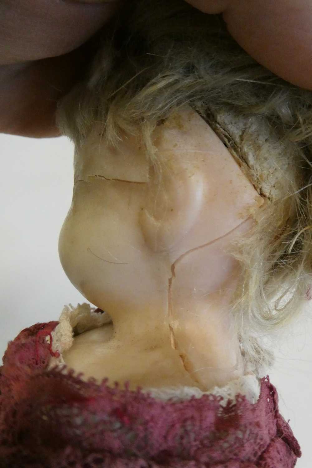 A Victorian wax shoulder head doll, with blue glass eyes, blond hair, closed mouth, kid body and - Image 3 of 5