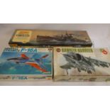 Three large scale plastic model kits comprising Hasegawa F16A, 1/32nd scale, Airfix Harrier 1/24th