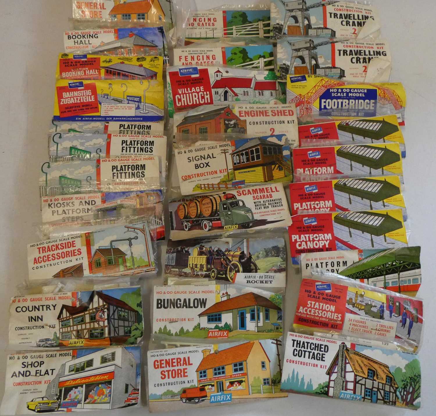 Thirty vintage bagged Airfix OO/HO scale line-side railway kits including buildings, trackside