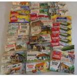 Thirty vintage bagged Airfix OO/HO scale line-side railway kits including buildings, trackside