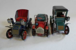 Three Nomura (TN) lever action spring driven vintage cars, all items have minor marks to tinplate,
