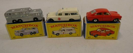 Matchbox No.3 Mercedes Benz, Ambulance #66, Greyhound bus and a number 67 Volkswagen 1600 TL boxes