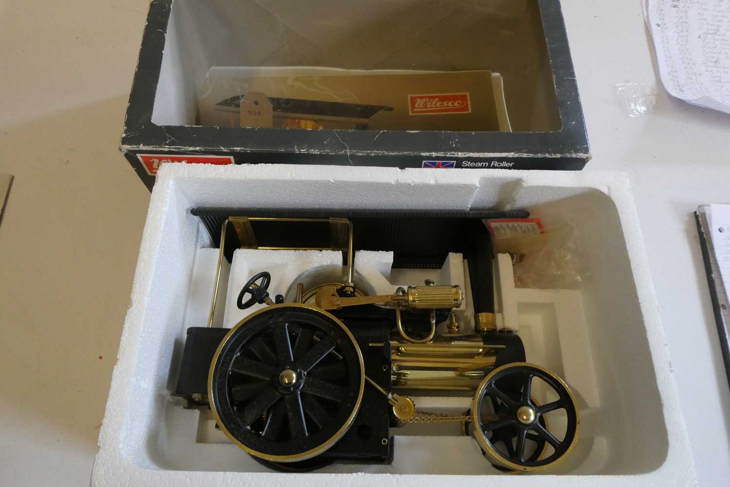 Wilesco steam traction engine finished in polished brass and black, boxed, good to excellent