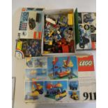 A box of vintage Lego, including sets 854, 107, 911 and other loose parts, completeness unchecked,