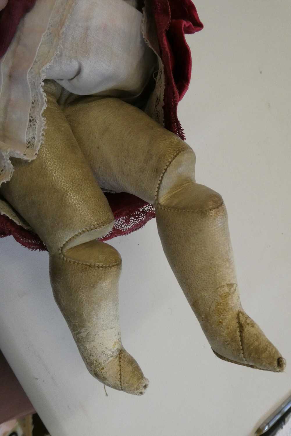 A Victorian wax shoulder head doll, with blue glass eyes, blond hair, closed mouth, kid body and - Image 5 of 5