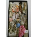 Collection of miniature dolls, including an all bisque nippon doll, a Victorian china head doll