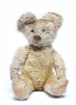 Pre-war Chad "Smiler" teddy bear, clear glass eyes, sewn nose, light orange plush and cloth pads, 14