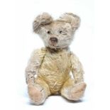 Pre-war Chad "Smiler" teddy bear, clear glass eyes, sewn nose, light orange plush and cloth pads, 14