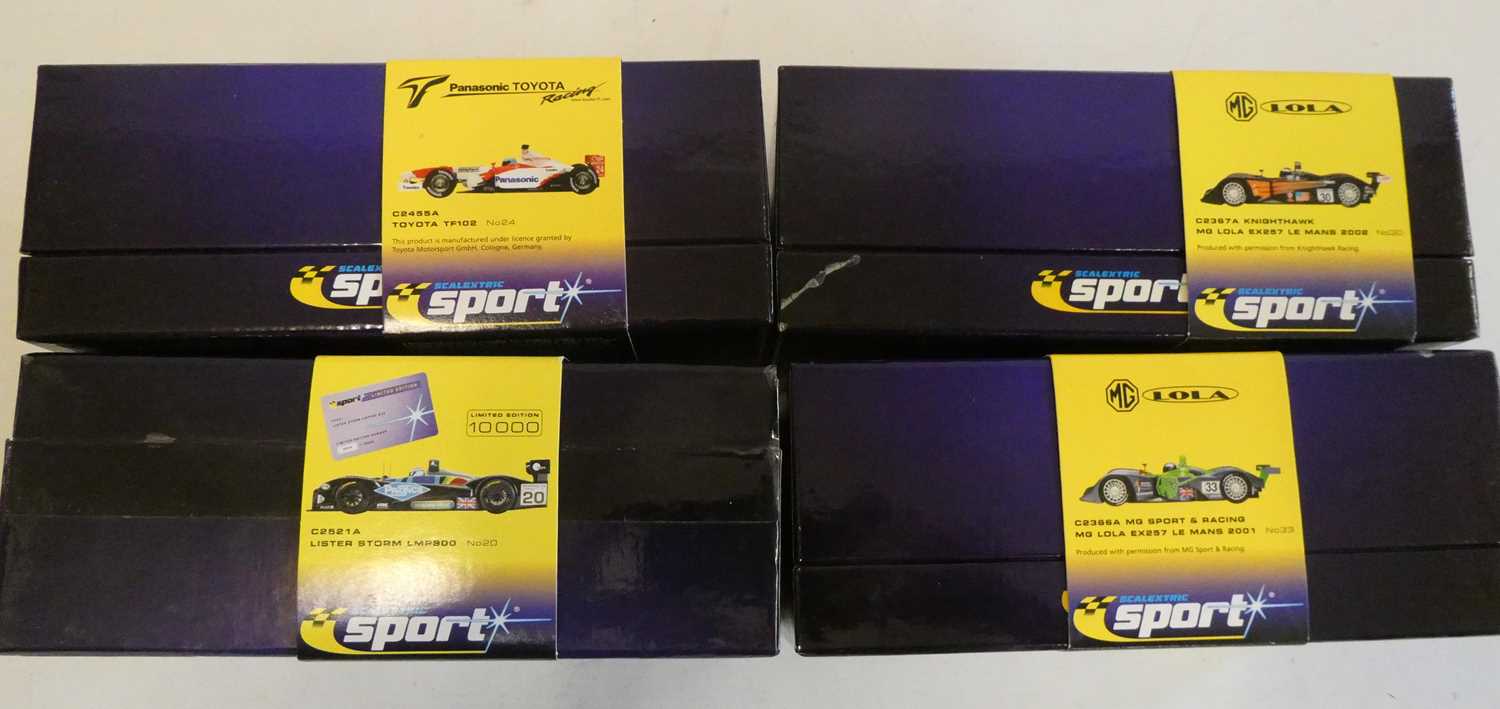 Four Scalextric cars comprising two MG Lolas, Toyota TF102 and Lister Storm, all items boxed,