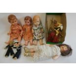 Seven vintage dolls, including two Norah Welling sailors, a Malaysian wood carved puppet,