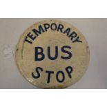 Hand painted temporary bus stop sign, some damage, fair