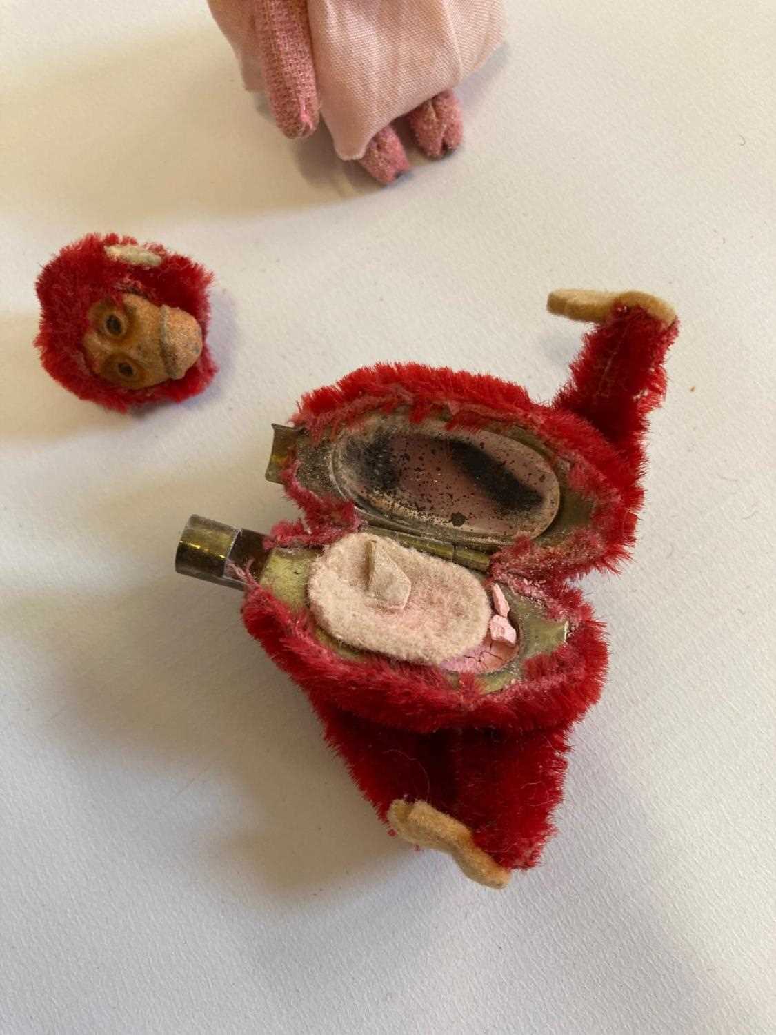 Two miniature Schuco animals, comprising a red monkey compact with internal mirror and puff, and a - Image 3 of 3