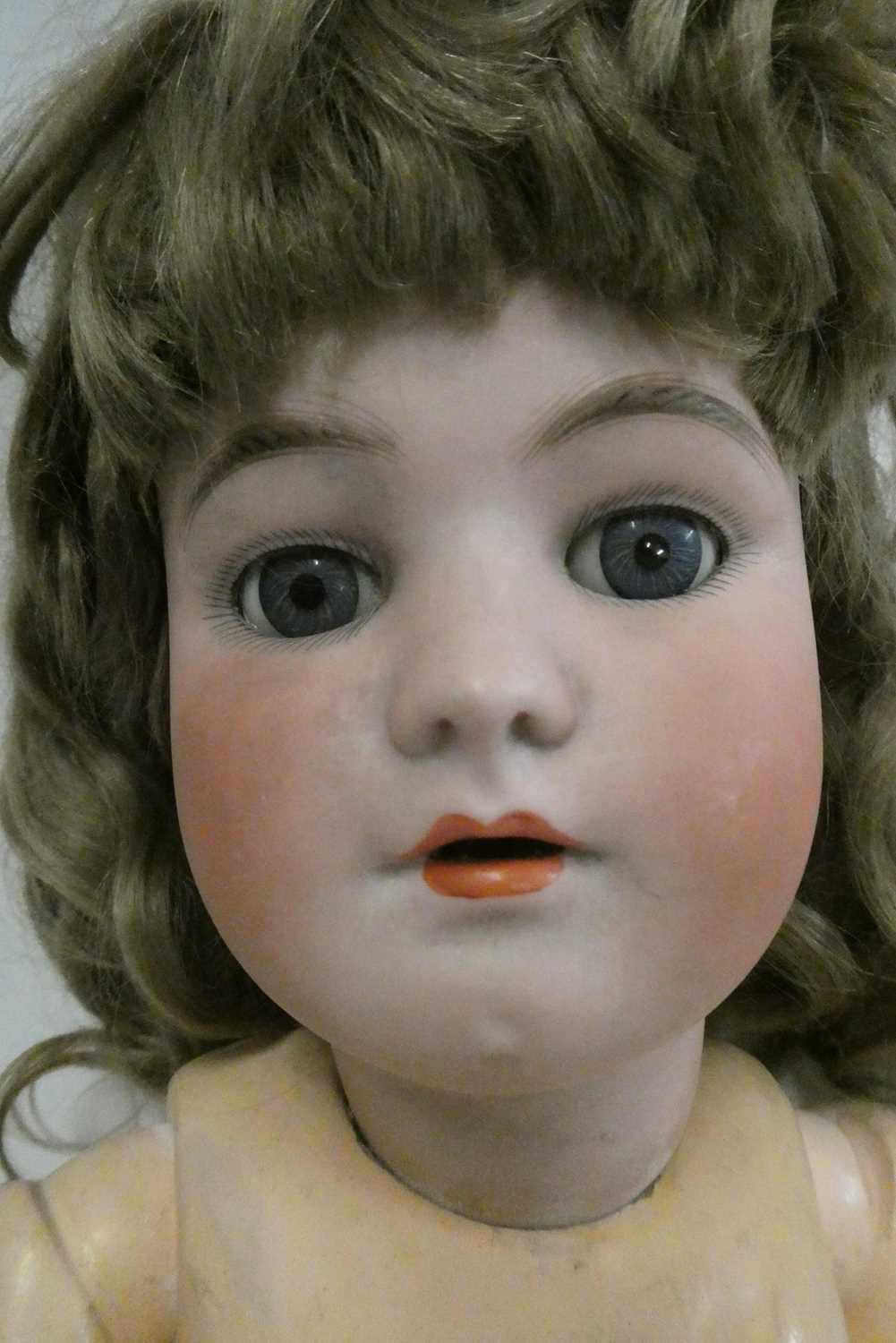 A Heinrich Handwerck Simon & Halbig bisque socket head doll, with blue glass sleeping eyes, open - Image 2 of 3