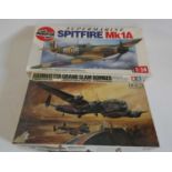Two plastic aircraft kits comprising Airfix 1/24th scale Spitfire (started) and Tamiya 1/48 scale