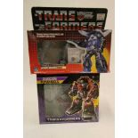 Two boxed Transformers, comprising Duocon Flywheels and Autobot Warrior Tracks, figures fair, box