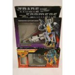 Two boxed Transformers, comprising Targetmaster Kup and Decepticon Ramjet, figures fair, box af