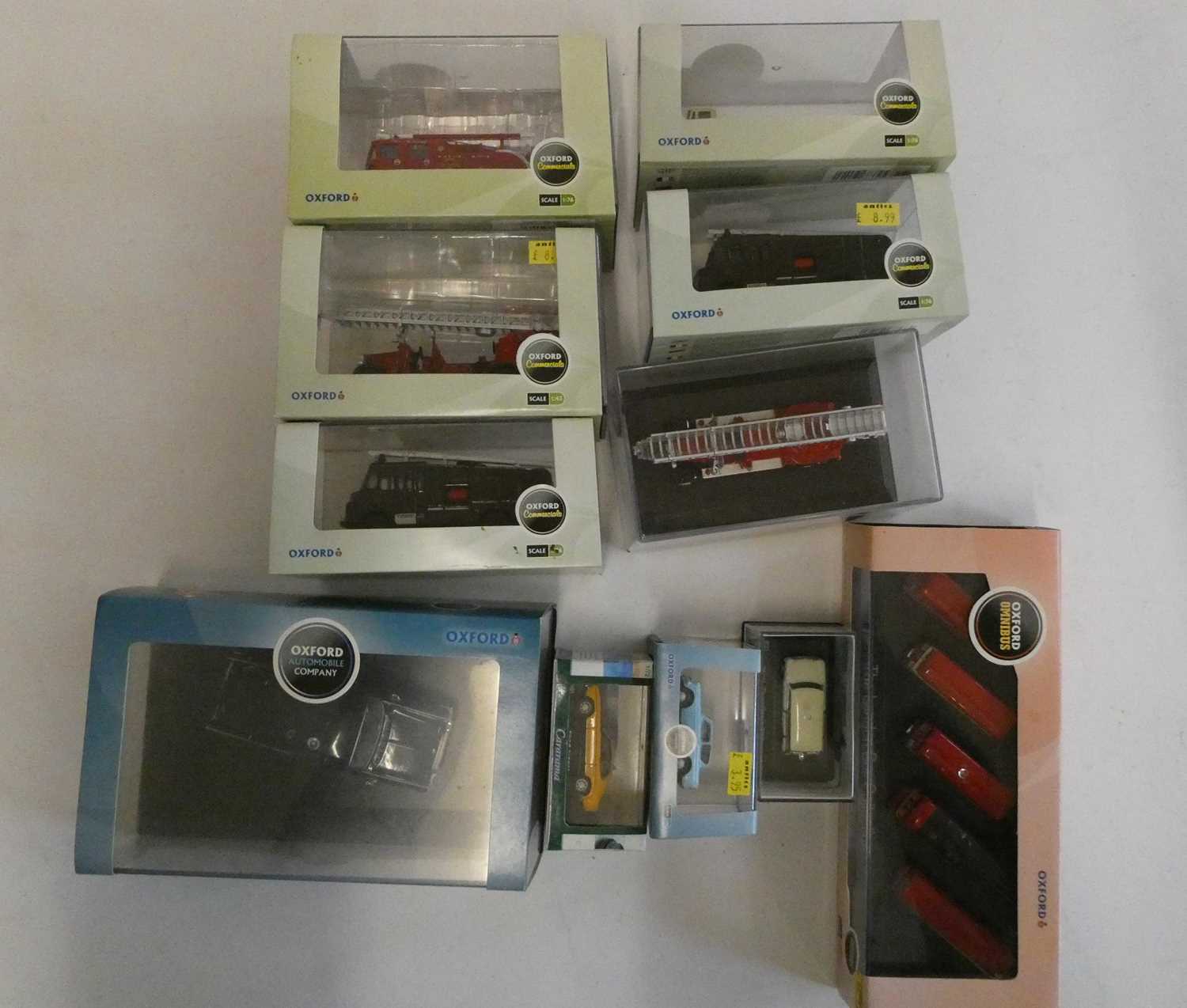 Eleven Oxford Commercials 1/76 scale diecast vehicles including fire engines and motor car, all