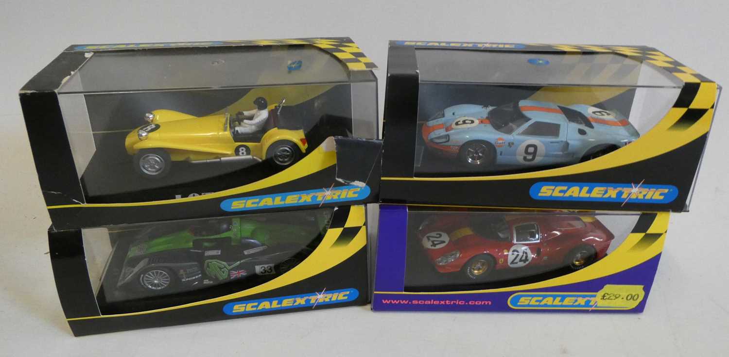 Four Scalextric cars comprising Ford GT40, Ferrari 330 and MG Lola, all items boxed, excellent