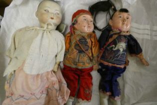 3 vintage oriental dolls, comprising one German bisque socket head example numbered 2 and two all