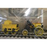 Gauge 1 static model of Stephenson’s rocket locomotive, in glass case, good