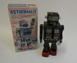 Honkawa (SH) battery operated Swivel-O-Matic Astronaut, tin construction with plastic arms and