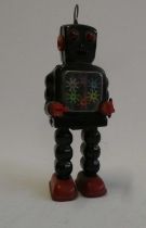 Yoshiya (KO) Japan clockwork walking robot with coloured gearing in body, tested in working order,