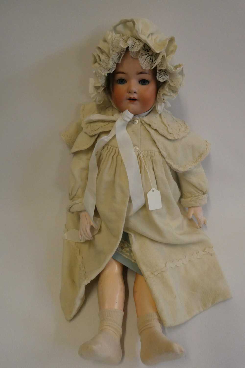 A Heubach Koppelsdorf bisque socket head character doll, with blue glass sleeping eyes, open