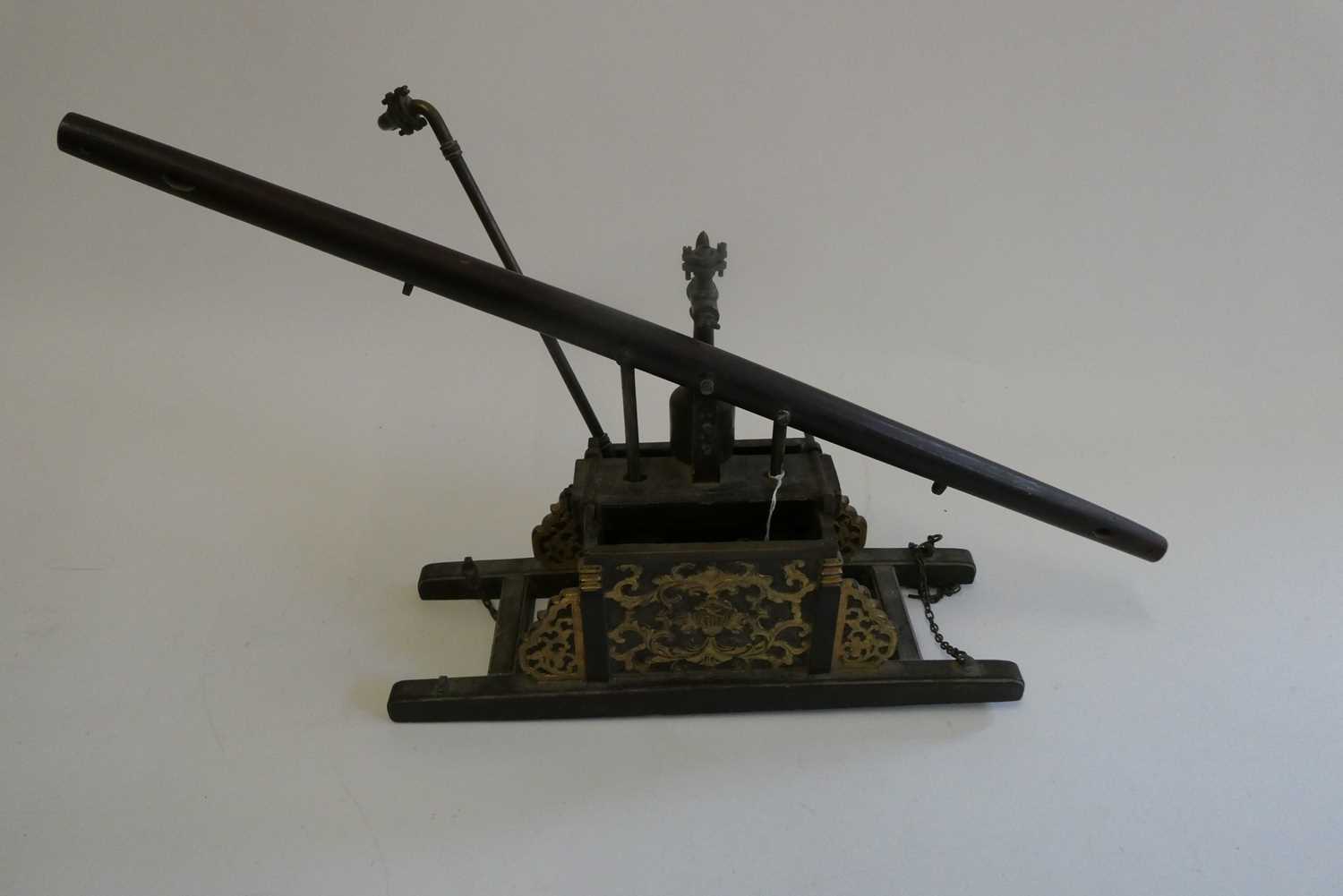 Model of Chinese hand operated fire water pump, wood and brass construction, carved decoration to