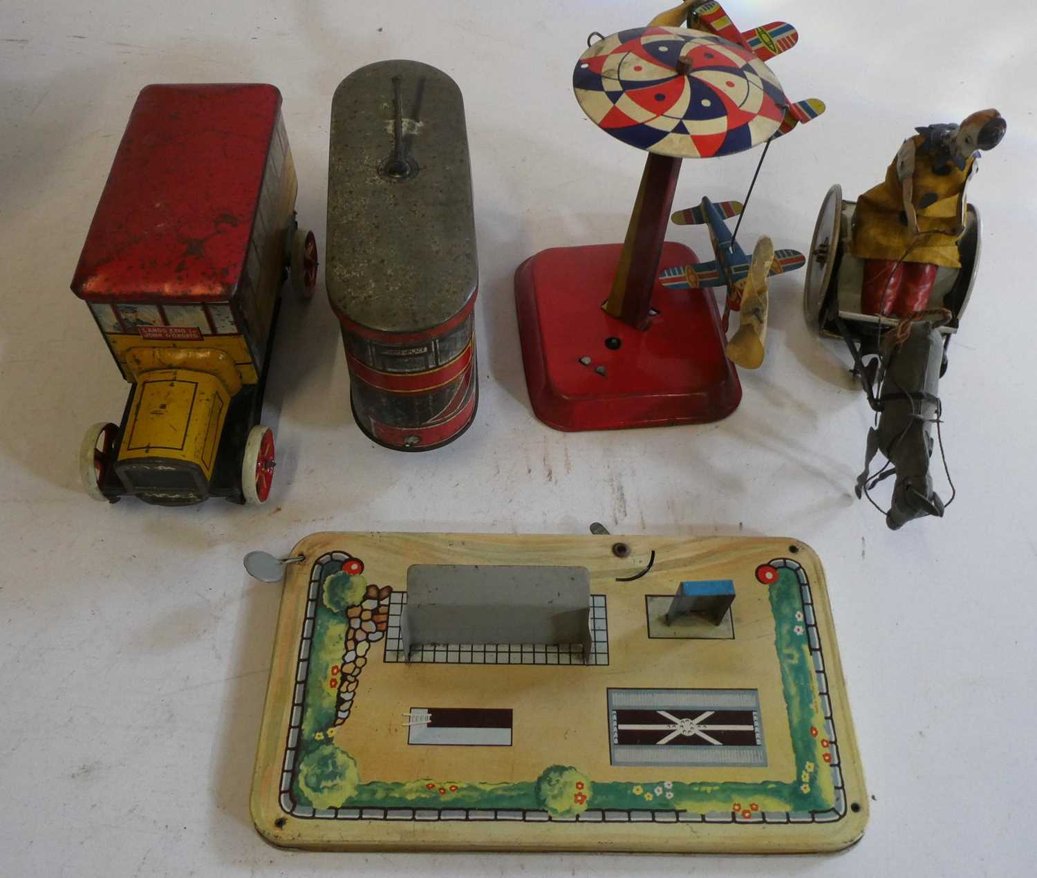 Tinplate biscuit tin tram and Gray Dunn’s biscuits bus, some rusting, paint damage fair and a
