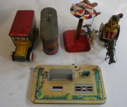 Tinplate biscuit tin tram and Gray Dunn’s biscuits bus, some rusting, paint damage fair and a