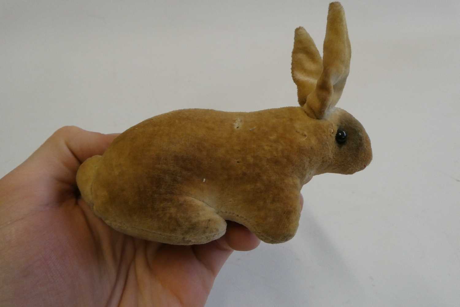 An early velvet rabbit, possibly Steiff, with shoe button eyes, 5