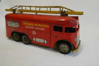 Joustra France Sapeurs Pompiers clockwork fire engine, some rusting to bodywork and paint chips, one