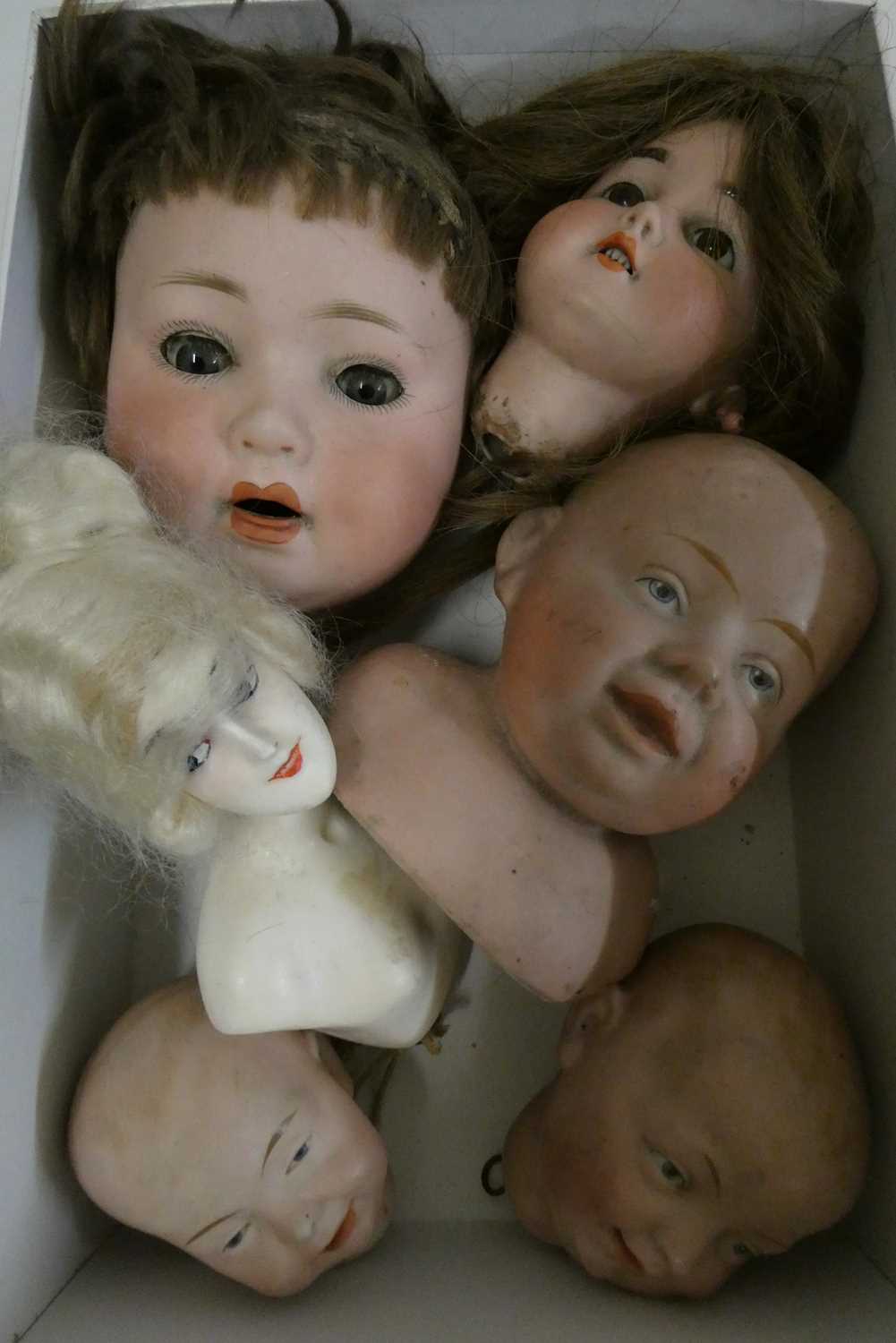 6 dolls heads, comprising an all wax possibly French fashion bust numbered 3, 2 possibly Kestner