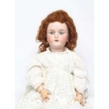 A Handwerck Halbig bisque socket head doll, with blue glass sleeping eyes, open mouth, teeth,