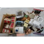 A large quantity of dolls house furniture and accessories, including mainly wood items and a a mid