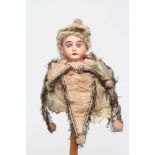 A Marotte bisque shoulder head doll, with blue glass fixed eyes, open mouth, teeth, blond wig,