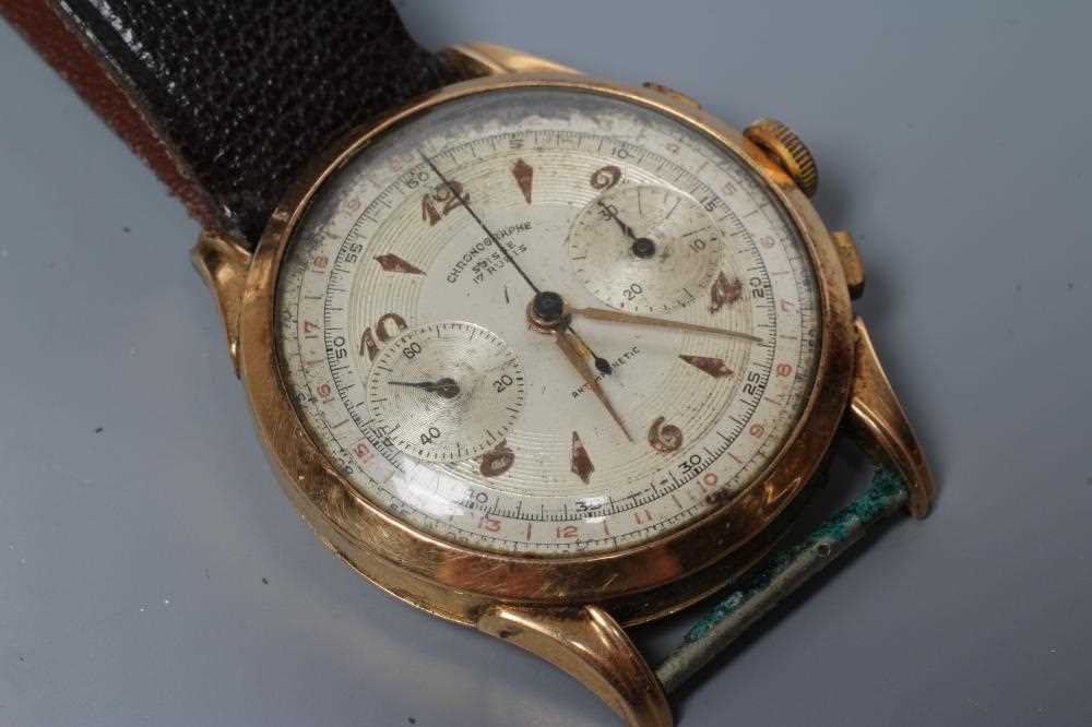 A GENTLEMAN'S 18CT GOLD CHRONOGRAPH, the champagne dial with centre seconds and two subsidiary