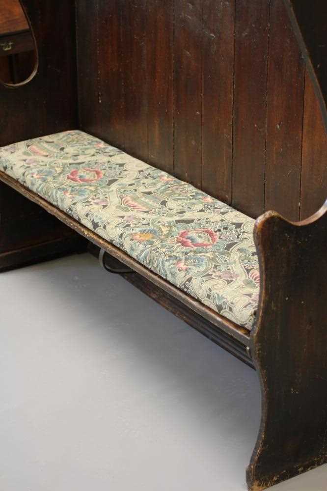 A STAINED PINE WING BACK TAVERN SETTLE, 19th century, with high boarded back, plank seat with - Image 5 of 5