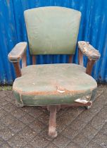 A vintage mahogany swivel desk chair with leather upholstery. 92cm h to back.