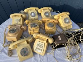 A collection of cream coloured telephones to include some wall mounted styles. Planphone, P.O. etc.