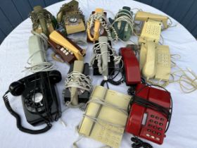 A collection of various styled telephones to include British Telecome, P.O. etc.