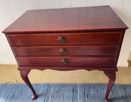 A three drawer cutlery table part filled with Community plate cutlery. 66cm w x 40cm d x 68cm h.