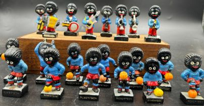 Twenty One Robertsons Figures, comprising eight jazz band figures, twelve footballers numbered 1-