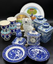 A mixed collection of ceramics to include: a 19thC Staffordshire dog, blue and white plates x 2, a