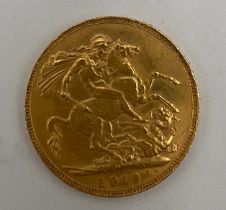 A George V full gold sovereign 1919.