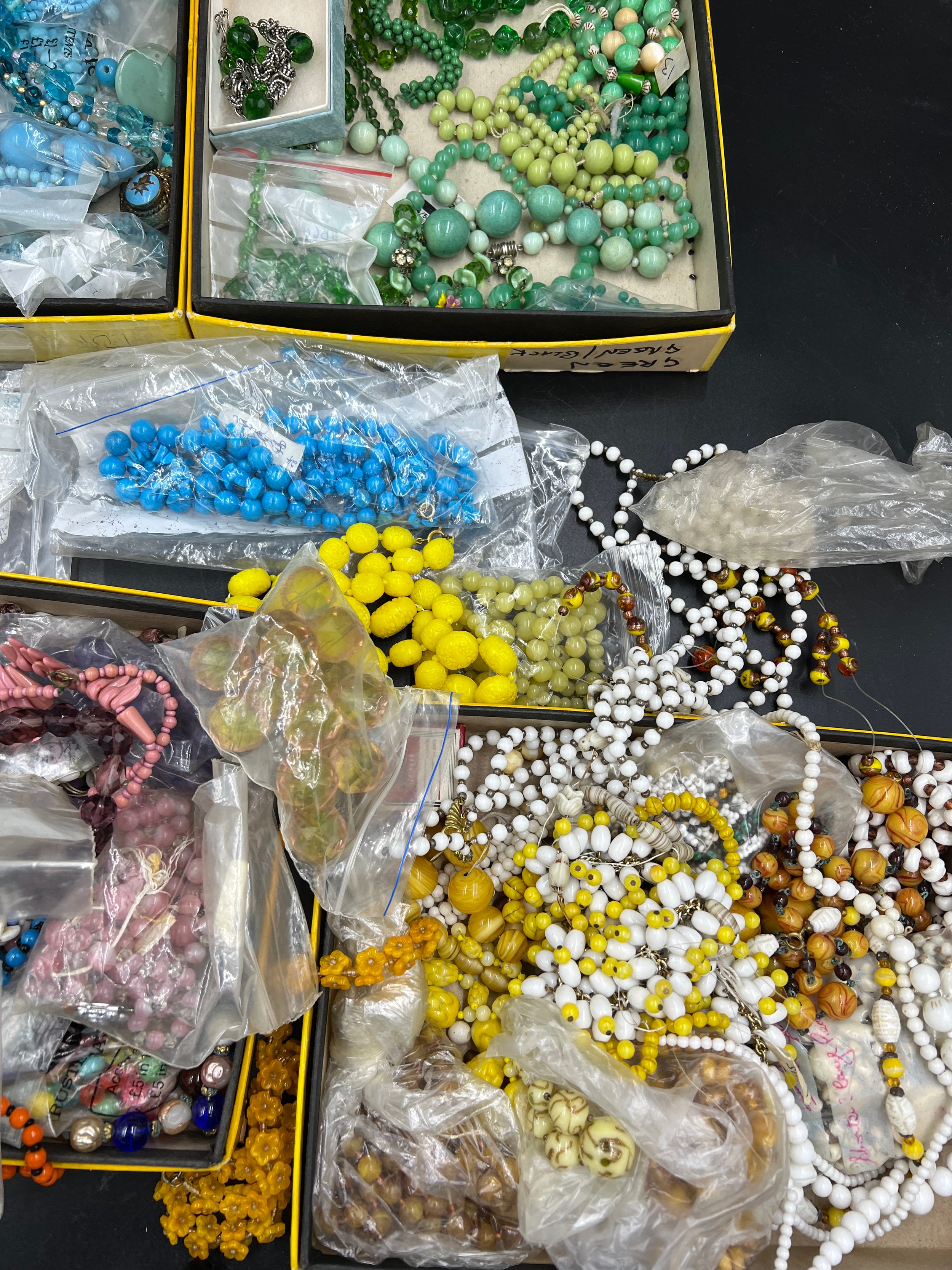 A large collection of various vintage glass and other coloured beads. Some in need of re threading. - Image 2 of 4